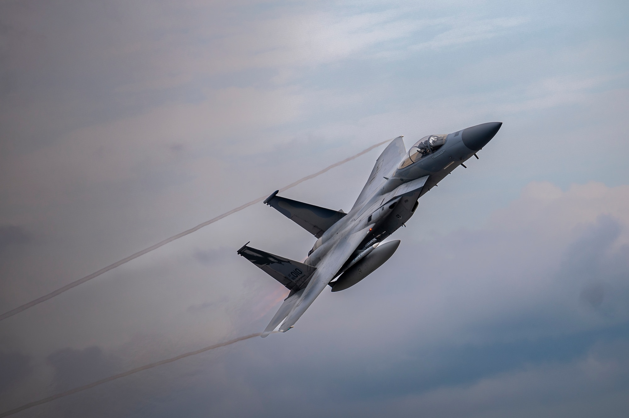 An F-15C Eagle assigned to the 194th Fighter Squadron, Fresno Air National Guard Base, Calif., flies over Tyndall Air Force Base, Fla. during Checkered Flag 23-2 at Tyndall AFB, Fla., May 17, 2023. Eligible active-duty aviators have until Sept. 15, 2023 to apply for the fiscal year 2023 Aviation Bonus Program; Air Force officials announced the Legacy Aviation Bonus Program will open June 6, 2023. (U.S. Air Force photo by Senior Airman Tiffany Del Oso)