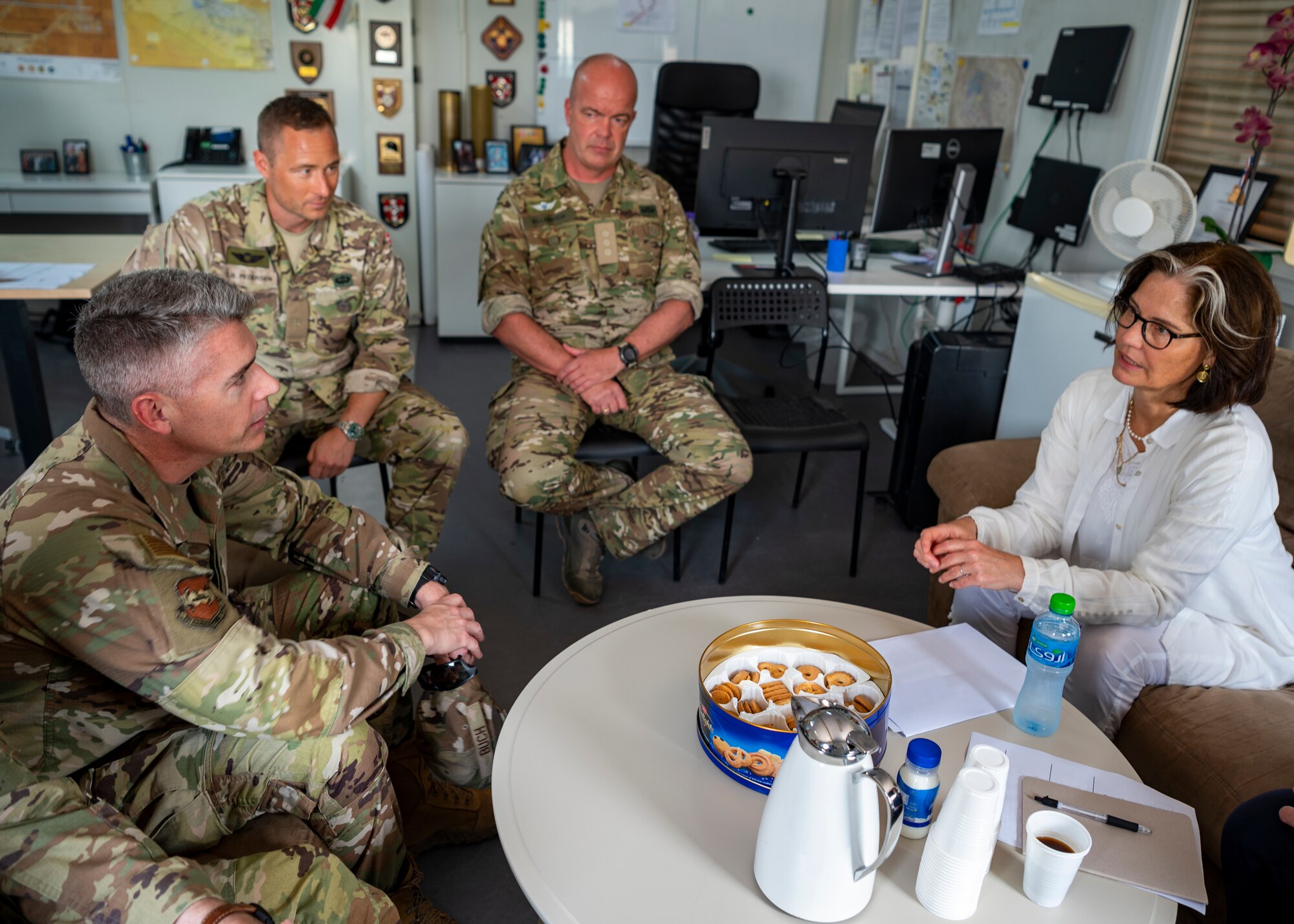 U.S. Air Force Col. George Buch, 386th Air Expeditionary Wing commander, along with Danish coalition partners in the region have a discussion with Liselotte Plesner, Ambassador of Denmark, at Ali Al Salem Air Base, Kuwait, May 31, 2023. The visit supported the valued partnership between Denmark and U.S. Forces to support stability in the region. (U.S. Air Force photo by Tech. Sgt. Isaac Garden)