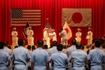 On behalf of Admiral Sakai Ryo, chief of staff, Japan Maritime Self Defense Force (JMSDF), Vice Adm. Tawara Tateki, Commander, Fleet Submarine Force, JMSDF , right, presents a First-Grade Defense Cooperation Medal to Rear Adm. Rick Seif, left, commanding officer, Commander, Submarine Group 7 during a change of command ceremony at Commander, Fleet Activities Yokosuka, Japan, on June 2, 2023. Submarine Group 7 directs forward-deployed, combat-capable forces across the full spectrum of undersea warfare throughout the Western Pacific, Indian Ocean, and Arabian Sea.