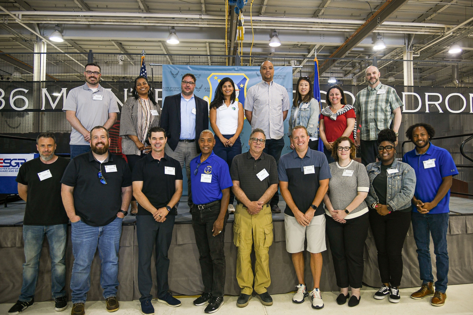 Civilian employees pose for a photo during Employer Day on Dover Air Force Base, Delaware, June 3, 2023. The employees were treated to a luncheon, where they were recognized with certificates of appreciation for supporting their Reserve employees. (U.S. Air Force photo by Senior Airman Shayna Hodge)