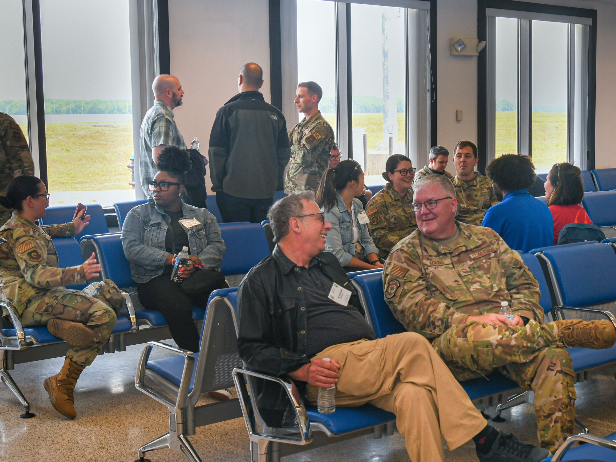 Reservists from the 512th Airlift Wing and their civilian employers wait inside the passenger terminal to board a C-17 Globemaster III aircraft on Dover Air Force Base, Delaware, June 3, 2023. The flight was the final activity employers participated in during the 512th AW’s Employer Day. (U.S. Air Force photo by Senior Airman Shayna Hodge)