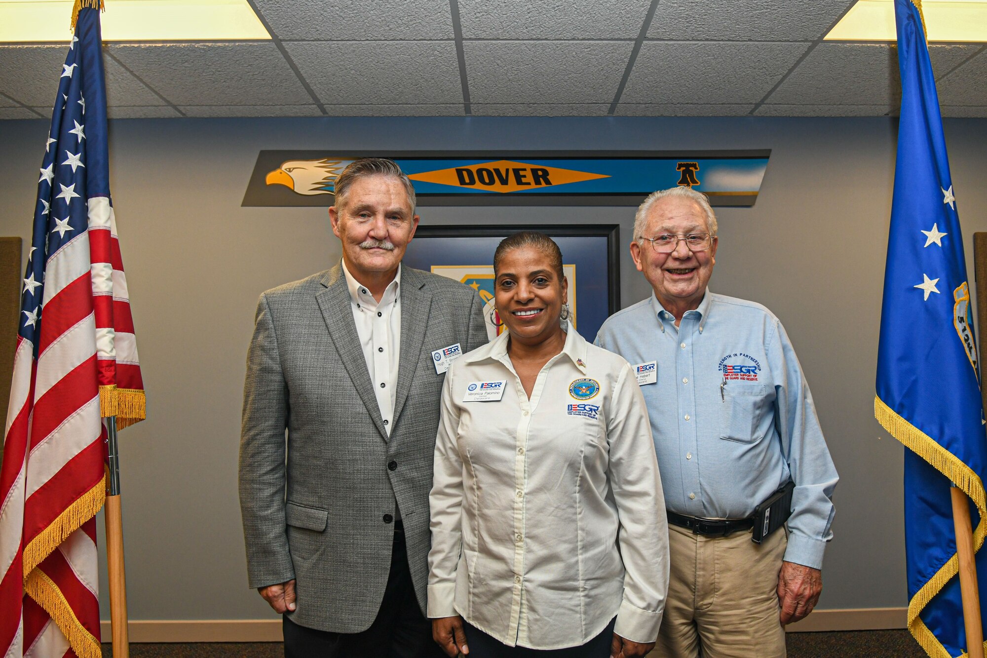 Left to right, retired Maj. Gen. Hugh Broomall, Chair of the Employer Support of National Guard and Reserve, Veronica Palomino, an ESGR volunteer, and retired Col. Gene Hebert, the ESGR Chair Emeritus, pose for a photo on Dover Air Force Base, Delaware, June 3, 2023. The 512th Airlift Wing and ESGR members collaborated to host Employer Day, an event that aimed to enhance employers’ understanding of how Air Force reservists are essential to successful operations in every domain. (U.S. Air Force photo by Senior Airman Shayna Hodge)