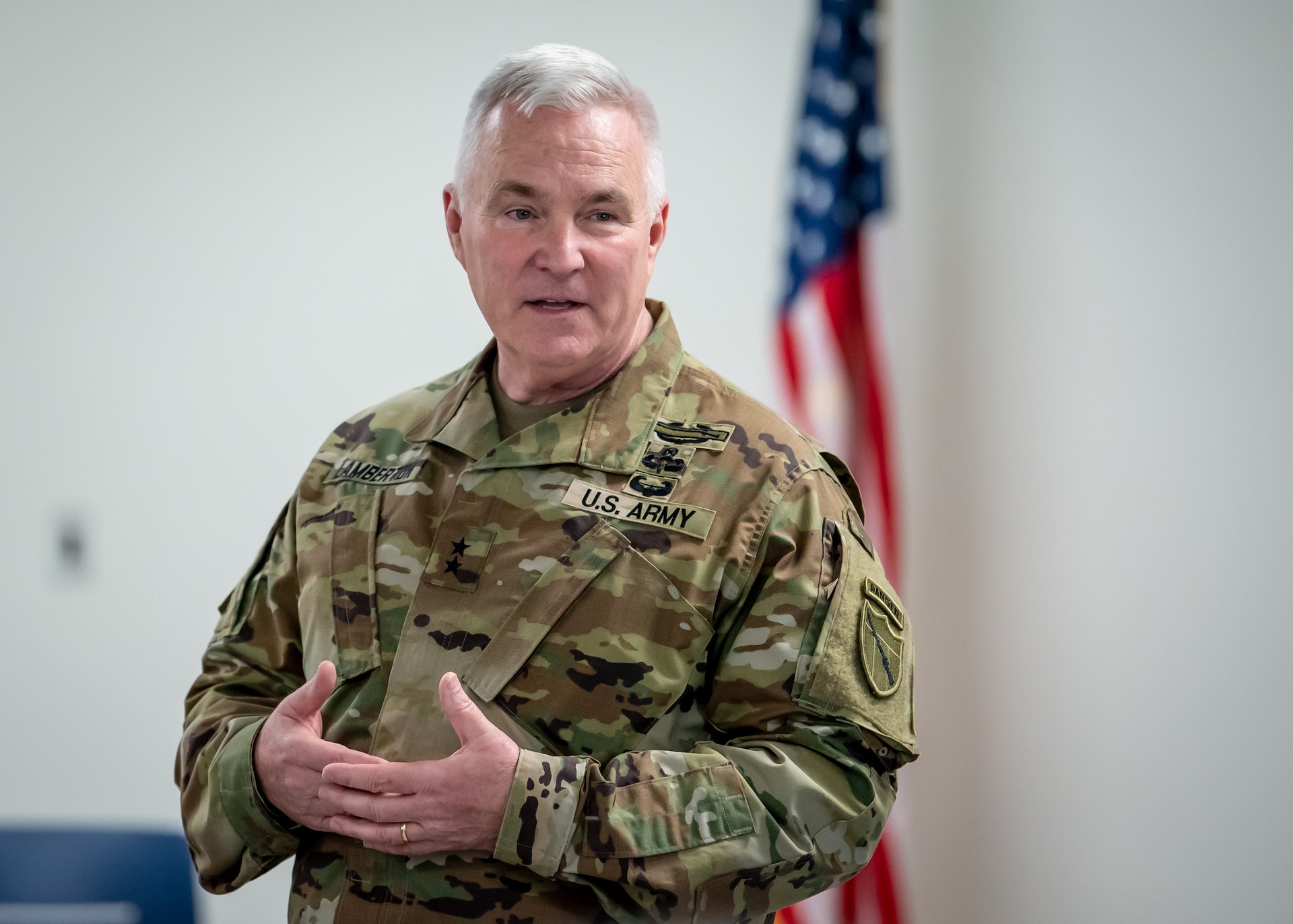 Army Maj. Gen. Haldane B. Lamberton, adjutant general of the Commonwealth of Kentucky, addresses a crowd of Airmen, friends and family during a ceremony honoring retirees from the 123rd Airlift Wing at the Kentucky Air National Guard Base in Louisville, Ky., April 22, 2023. During the ceremony, a black granite plaque was unveiled that listed the names of more than 50 Airmen who retired in 2022. (U.S. Air National Guard photo by Senior Airman Madison Beichler)