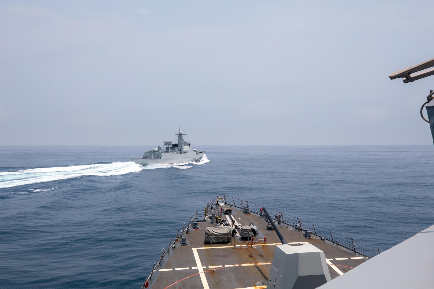 TAIWAN STRAIT (June 3, 2023) The Arleigh Burke-class guided-missile destroyer USS Chung-Hoon (DDG 93) observes PLA(N) LUYANG III DDG 132 (PRC LY 132) execute maneuvers in an unsafe manner while conducting a routine south to north Taiwan Strait transit alongside the Halifax-class frigate HMCS Montreal (FFG 336), June 3. USS Chung-Hoon is on a routine deployment to U.S. 7th Fleet and is assigned to Commander, Task Force (CTF 71)/ Destroyer Squadron (DESRON) 15. CTF 71/DESRON 15 is the largest forward-deployed DESRON and the U.S. 7th Fleet’s principal surface force. (U.S. Navy photo by Mass Communication Specialist 1st Class Andre T. Richard)