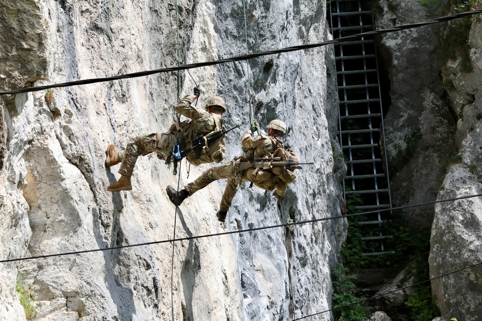 Mountaineers with the 1-157th Mountain Infantry Battalion, Colorado Army National Guard, work alongside NATO partners to showcase their abilities to distinguished visitors during DEFENDER 23 at Bohinjska Bela, Slovenia, May 25, 2023. DEFENDER 23 includes more than 7,000 U.S. and 17,000 multinational service members from more than 20 nations.