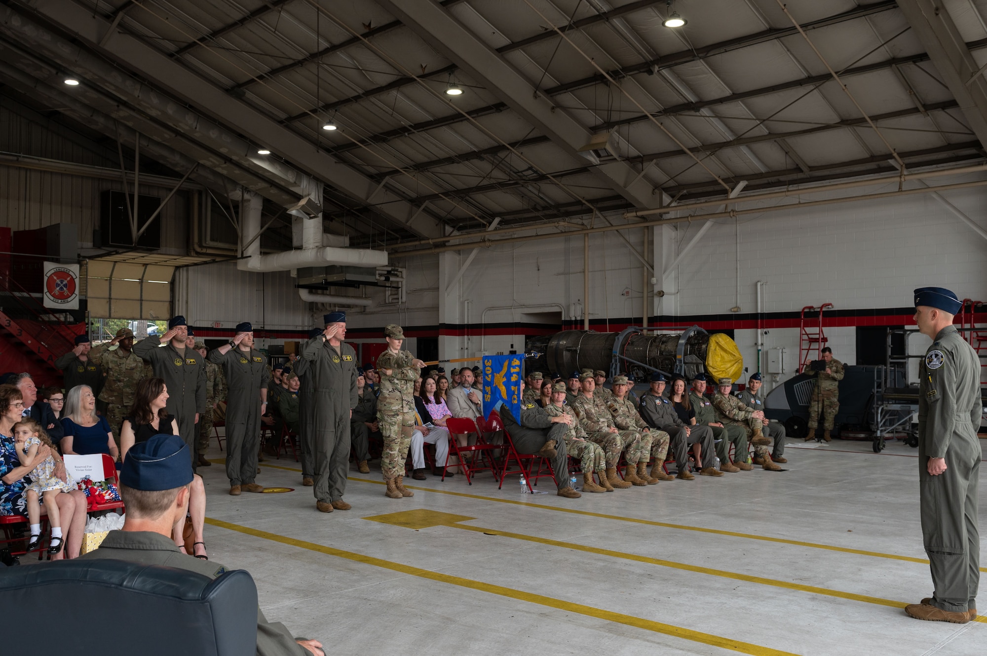 U.S. Air Force Lt Col. Andrew Blaser, incoming 307th Fighter Squadron commander, renders his first salute to the 307th FS during a change of command ceremony at Seymour Johnson Air Force Base, North Carolina, June 2, 2023. The first salute is tradition in marking the beginning of a new command. (U.S. Air Force photo by Airman 1st Class Rebecca Sirimarco-Lang)