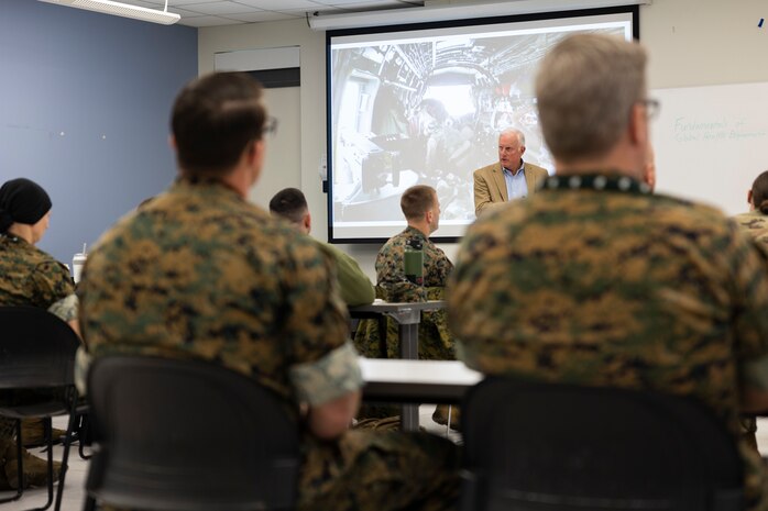 U.S. Navy Rear Adm. (Ret.) Thomas Cullison, former deputy surgeon general, U.S. Navy, teaches fundamentals of global health engagement to a class on Camp Lejeune, North Carolina, Mar. 21, 2023. Marine Forces Special Operations Command hosted the course for military health care professionals at all levels to broaden their knowledge on the subject and its relationship to the special operations forces area of operations.