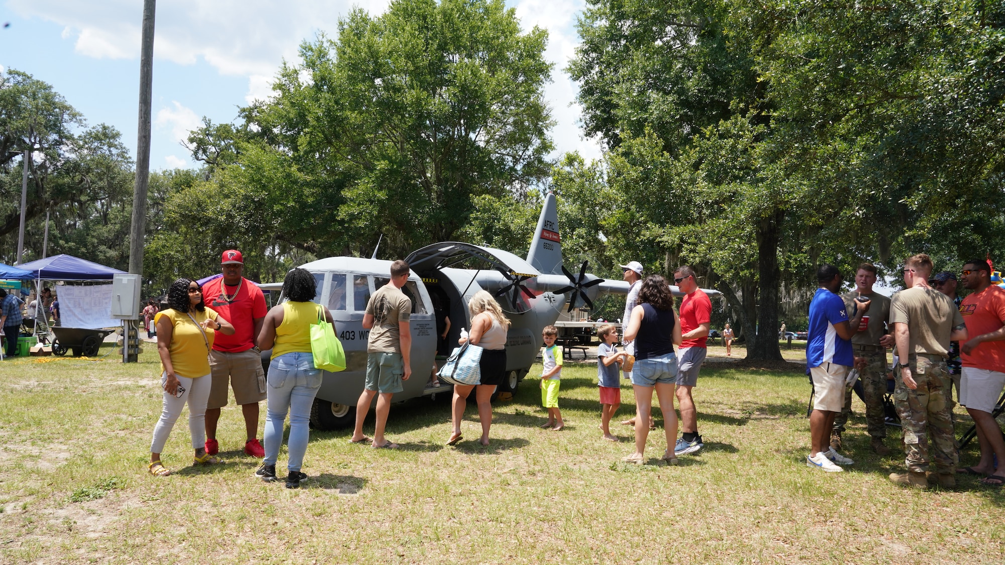 Wing members and families tour through Lil Bill during the family day celebration.