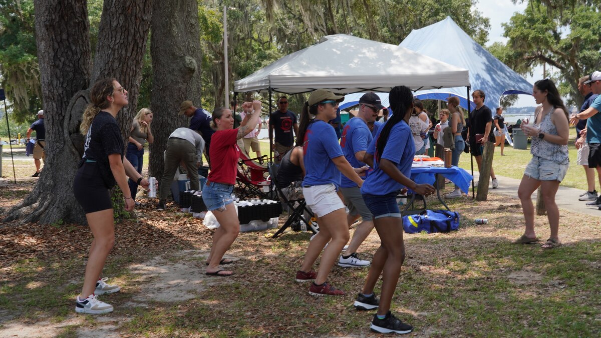 Wing members dance to the music provided by the DJ during the family day celebration.