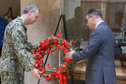 Naval Surface Warfare Center, Philadelphia Division (NSWCPD) Commanding Officer Capt. Joseph Darcy and Veterans Employee Resource Group (VERG) Champion Gary Saladino lay a wreath to honor fallen United States military personnel during NSWCPD’s annual Memorial Day Ceremony on May 23, 2023. (U.S. Navy photo by Sgt. Jermaine Sullivan/Released)