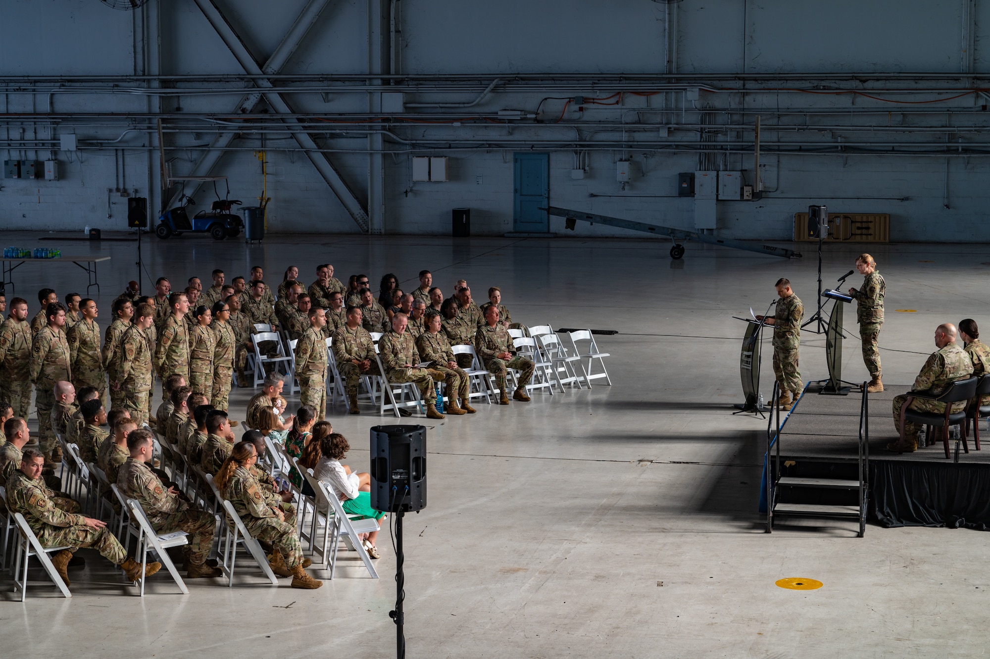 Airmen assigned to the 6th Air Refueling Wing listen to a speech during the 6th Aircraft Maintenance Squadron change of command ceremony at MacDill Air Force Base, Florida, June 5, 2023.