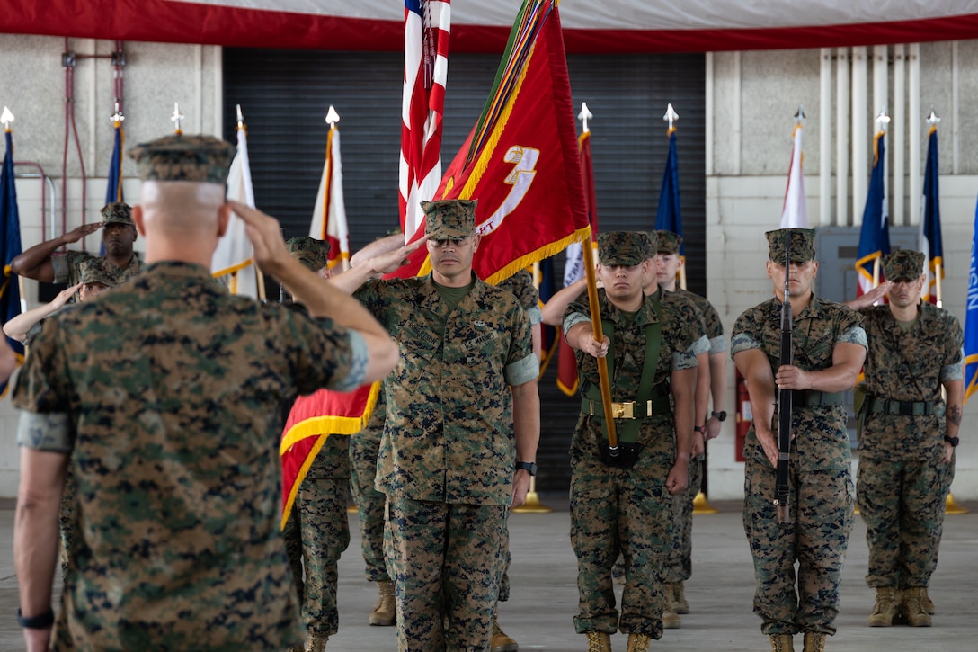 U.S. Marine Corps Sgt. Maj. James Robertson, salutes Col. Brendan Burks, Marine Corps Air Station (MCAS) Cherry Point commanding officer, during a relief and appointment ceremony on MCAS Cherry Point, North Carolina, May 23, 2023. The historic post and relief ceremony is a time-honored tradition within the U.S. Marine Corps. The ceremony serves as the official changeover between Sergeants Major, honoring the outgoing Sgt. Maj. contributions during his tenure, while offering the opportunity for the oncoming Sgt. Maj. to introduce himself to the Marines now under his charge. (U.S. Marine Corps photo by Cpl. Jade Farrington)