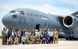 Employer Support of the Guard and Reserve members and 512th Airlift Wing Airmen pose for a group photo in front of a C-17 Globemaster III at Dover Air Force Base, Delaware, June 3, 2023. ESGR, a Department of Defense office, was established in 1972 to promote cooperation and understanding between Reserve Component Service members and their civilian employers and to assist in resolving conflicts arising from an employee's military commitment. (U.S. Air Force photo by Airman 1st Class Amanda Jett)