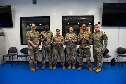 37th Training Wing leaders publicly recognize Security Forces instructors who helped rescue a woman being attacked by yellow jackets.