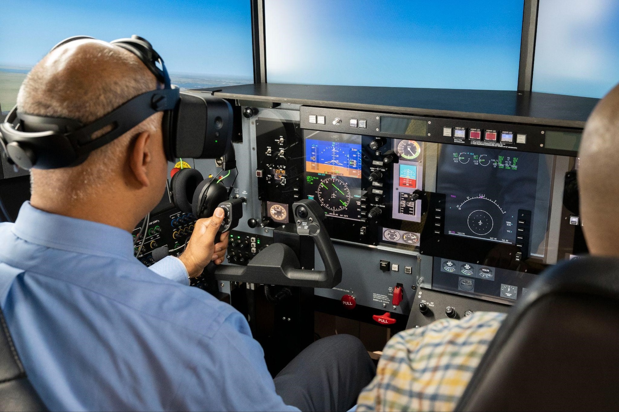 The Hon. Ravi Chaudhary, Assistant Secretary of the Air Force for Energy, Installations, and Environment, flies in a T-1A Jayhawk simulator at Laughlin Air Force Base, Texas, on May 31, 2023. (U.S. Air Force photo by Airman 1st Class Kailee Reynolds)
