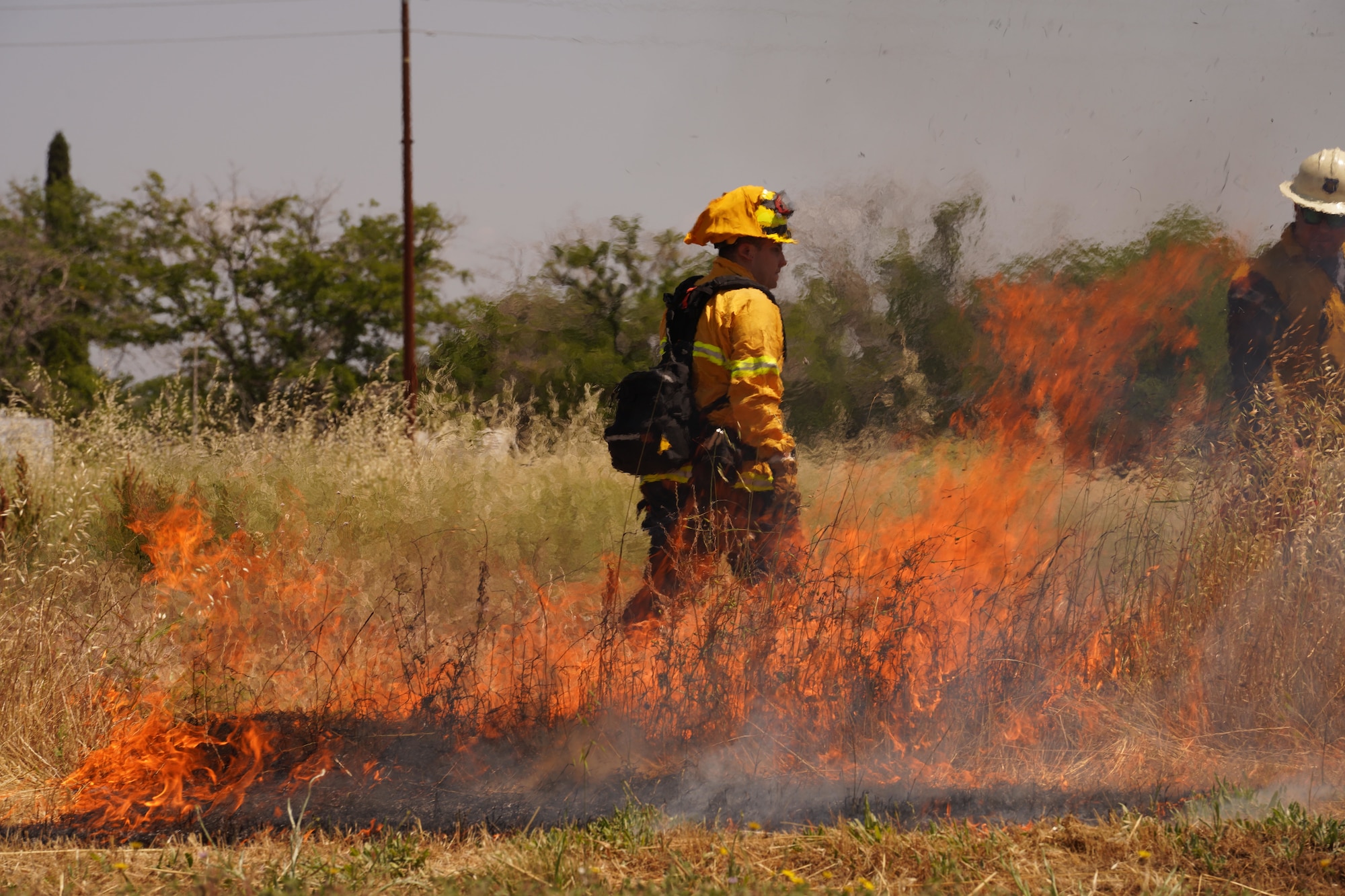 Wildland Support Module members participate in a prescribed burn June 2, 2023, at Beale Air Force Base, California.