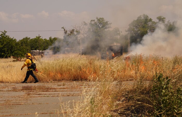 A Wildland Support Module member participates in a prescribed burn June 2, 2023, at Beale Air Force Base, California.