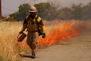 A Wildland Support Module member participates in a prescribed burn June 2, 2023, at Beale Air Force Base, California.