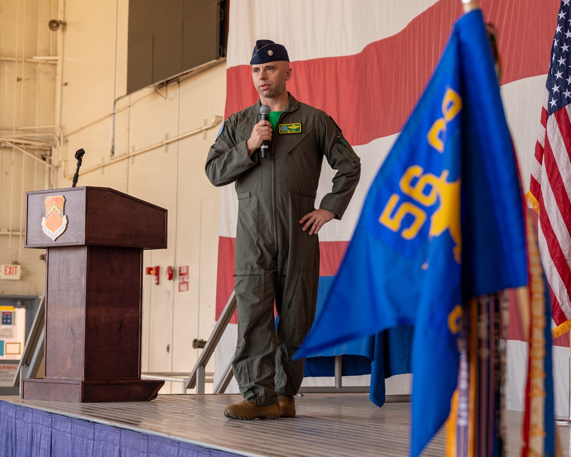 U.S. Air Force Lt. Col. Adam Vogel, 310th Fighter Squadron commander, gives remarks at the 310th FS assumption of command ceremony June 2, 2023, at Luke Air Force Base, Arizona.