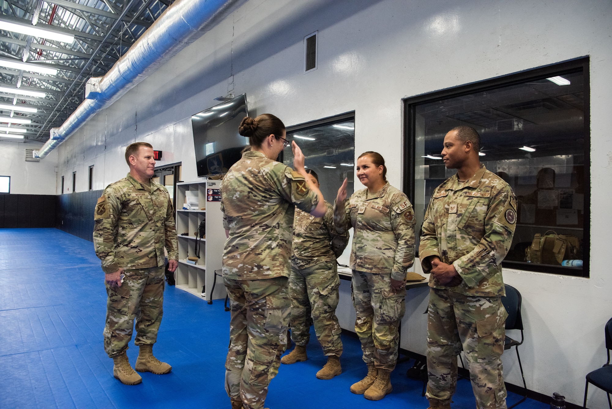 37th Training Wing leadership publicly recognize Security Forces Instructors who help rescue woman being attached by yellow jackets.