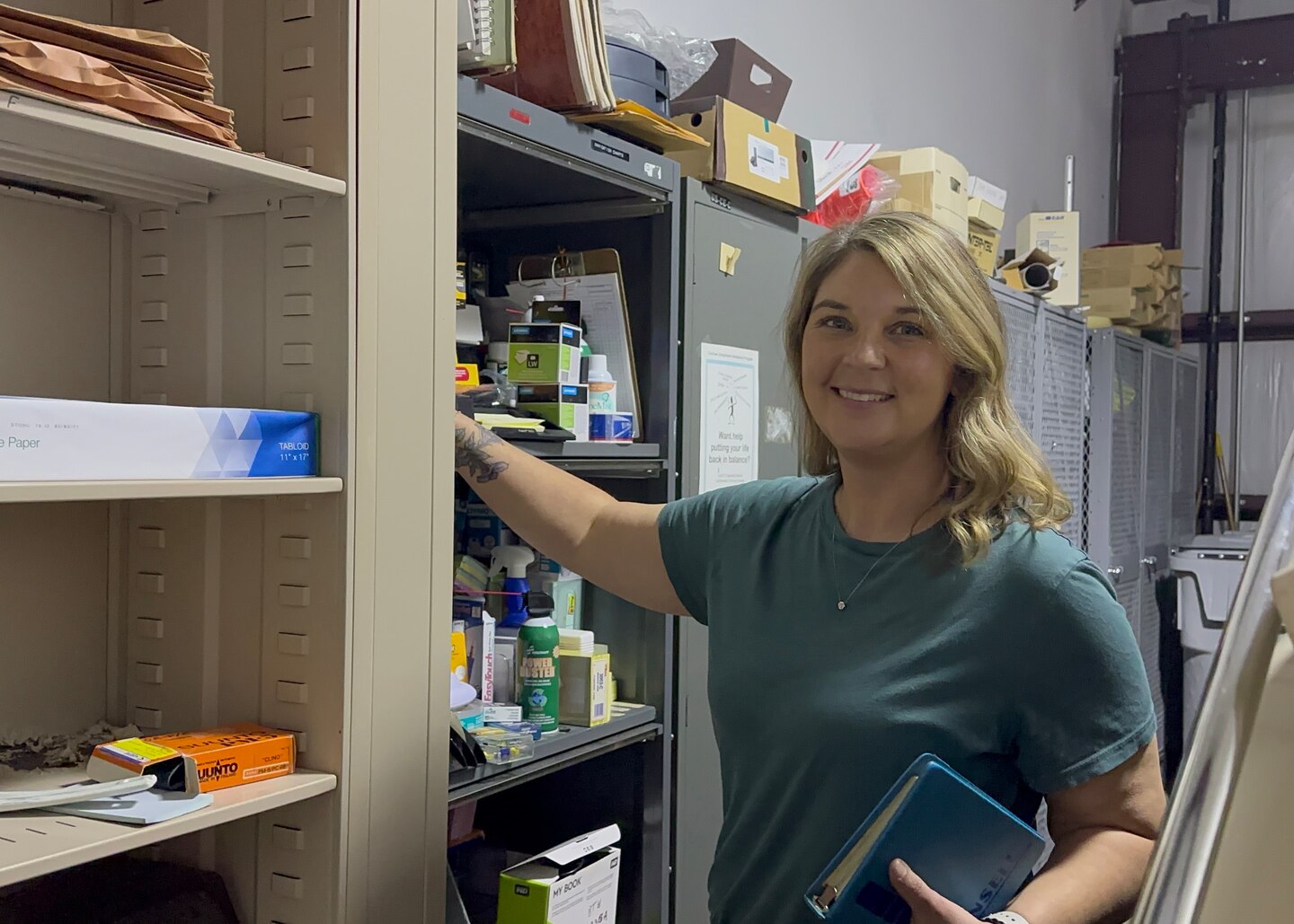 Regulatory Specialist Mary Ann Brannan collects her tools and classification guide before heading out to a potential wetland to collect soil and conduct an inspection to determine if a permit can be granted for construction in Lenoir City, Tennessee on June 2, 2023.