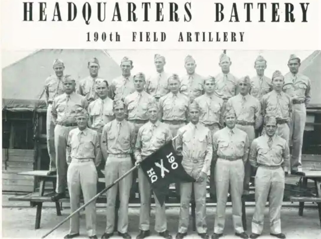 Officers of Headquarters and Headquarters Battery, 190th Field Artillery pose for a photograph at Camp Shelby, Mississippi, in 1941.