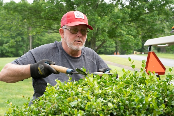 Tim and Margie Carter help with various tasks, like landscaping, to help maintain the property at Patoka Lake in exchange for being able to park and connect their 38-foot camper there.
