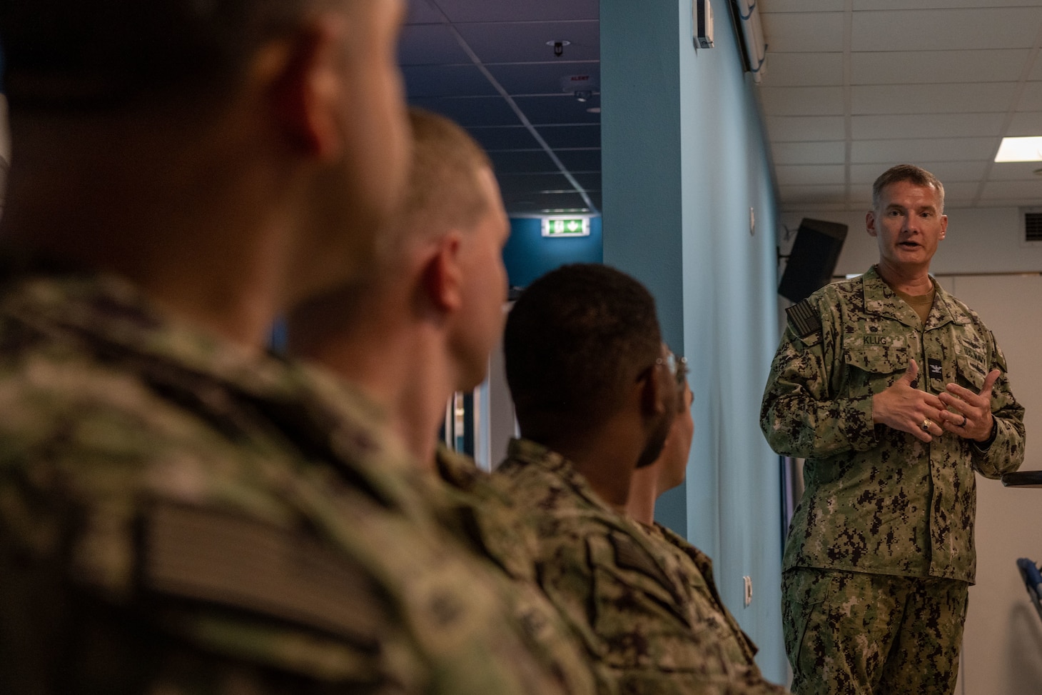 Capt. Odin J. Klug, commanding officer, Naval Support Activity Souda Bay, discusses the significance of the D-Day invasion during a Remembrance Ceremony held in The Anchor on June 6, 2023.