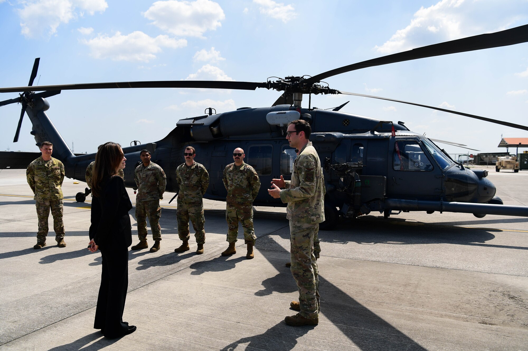 Jamie Harpootlain, U.S. Ambassador to the Republic of Slovenia, poses for a photo with base leadership at Aviano Air Base, Italy, May 1, 2023.