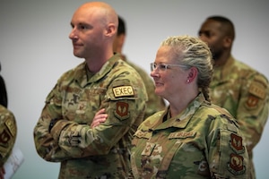 U.S. Air Force Chief Master Sgt. Stephanie Cates, Third Air Force command chief, visits the newly established Information, Tickets and Travel office
