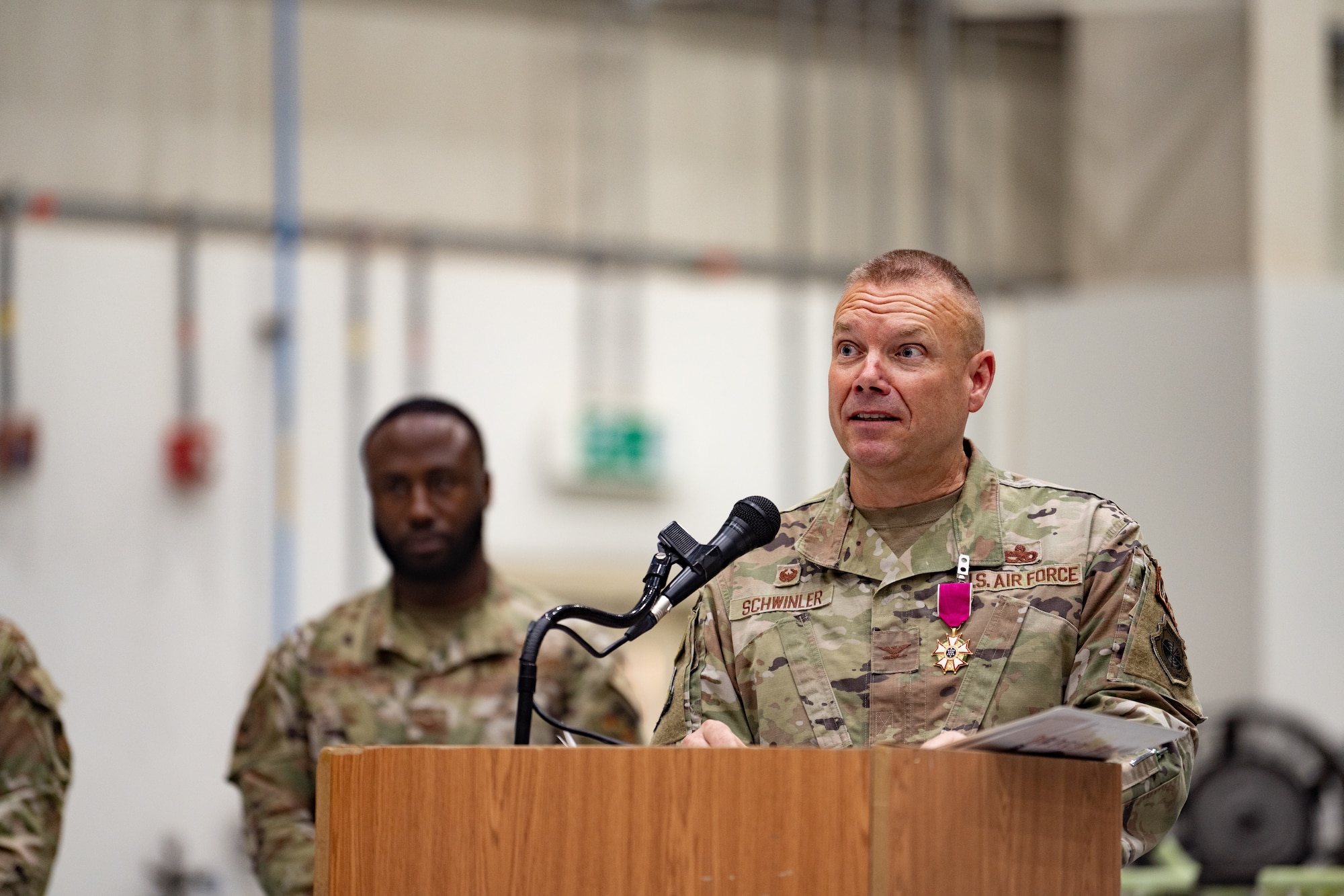 Photo of person talking at a podium