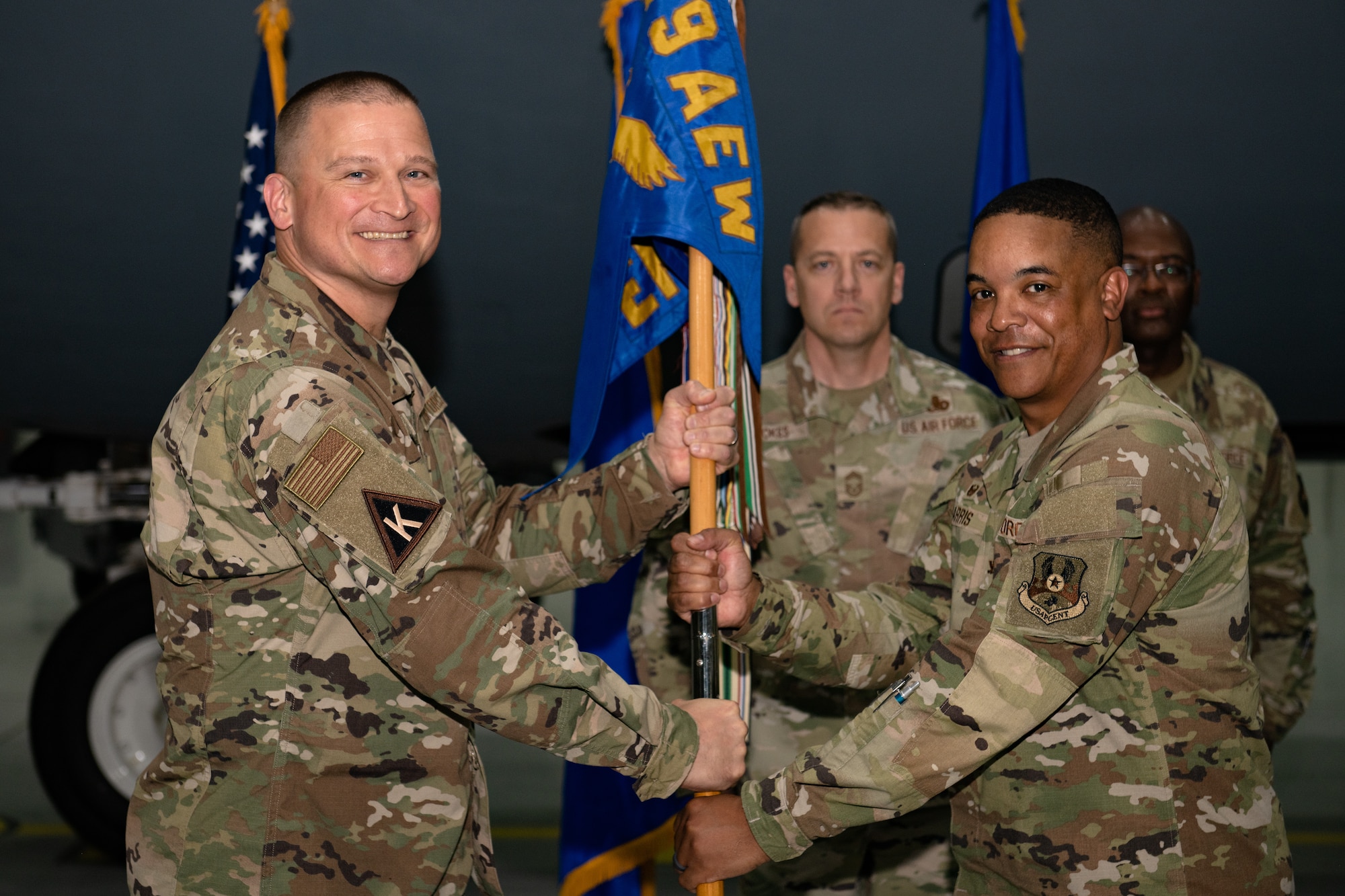 Photo of people holding a flag