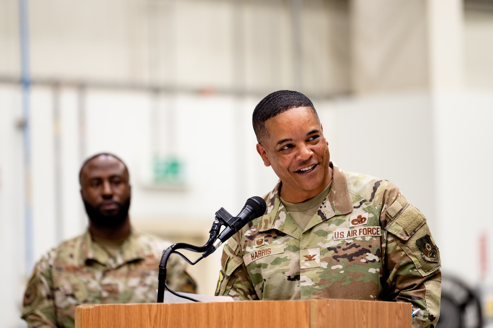 Photo of person talking at podium