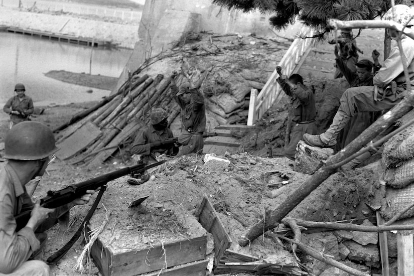 Foreign soldiers surrender during wartime.