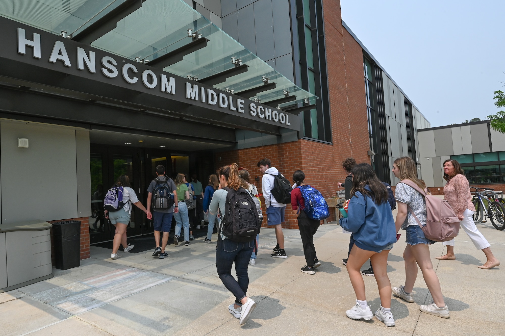 Image of students walking into building