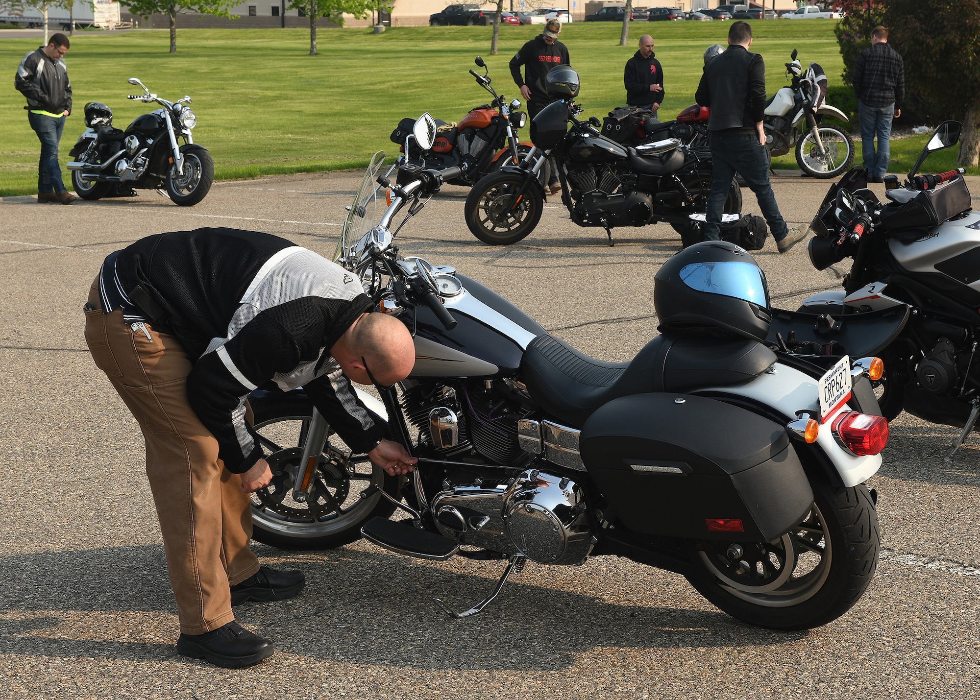 Airmen participate in a motorcycle mentorship ride