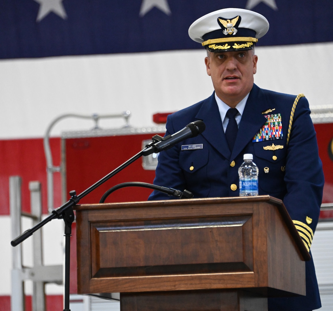 U.S. Coast Guard Capt. Greg Magee, Deputy Director of Operational Logistics, Coast Guard Headquarters,  
addresses Base Kodiak personnel and audience members during a change-of-command ceremony at Air Station Kodiak, June 6, 2023. The change-of-command ceremony is a historic Coast Guard and Naval tradition, which has remained unchanged for centuries and includes the reading of the command orders in the presence of all unit crewmembers. U.S. Coast Guard photo by Petty Officer 3rd Class Ian Gray.