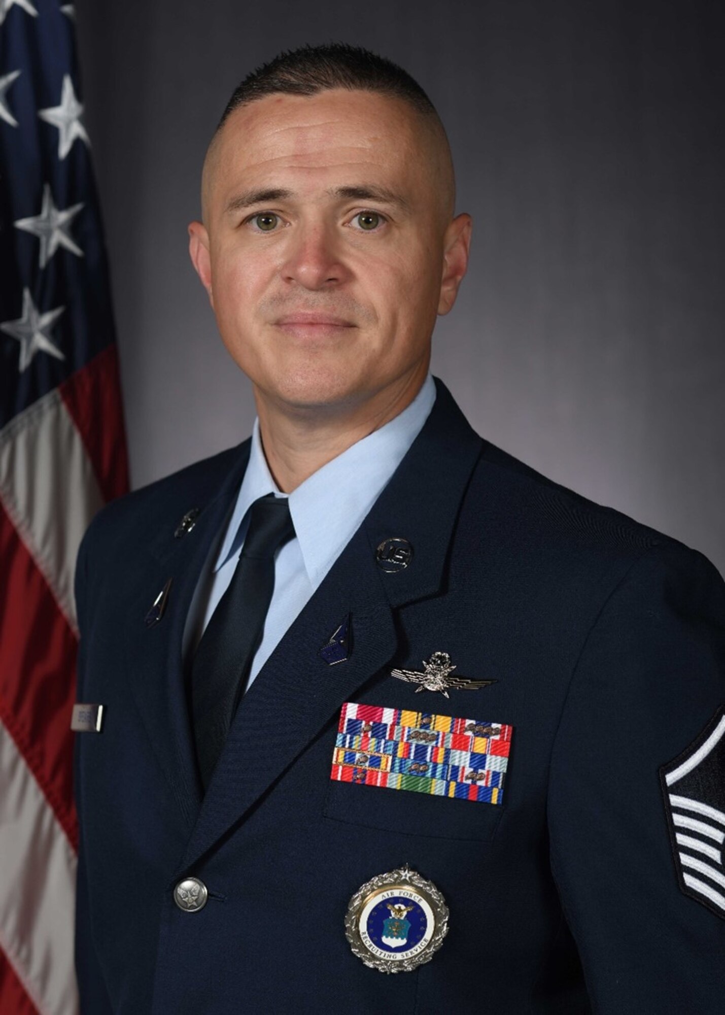 U.S. Space Force Master Sgt. Joseph D. Spears, 30th Space Communications Squadron cyber security section chief, poses for an official photo at Vandenberg Space Force Base, Calif., May. 31, 2023. After multiple attempts, Spears recently earned a spot to attend Officer Training School at Maxwell Air Force Base, Ala. Following OTS graduation, he will return to Vandenberg and attend training at the 533rd Training Squadron to become a space operations officer.  (U.S. Space Force photo by Airman 1st Class Ryan Quijas)