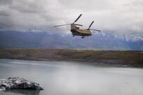 Chinook flying near Knik Glacier