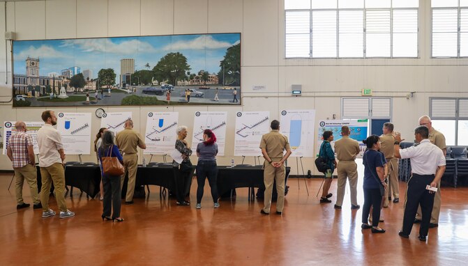 Joint Task Force-Red Hill (JTF-RH) leaders engage with local residents during an open house hosted by the Hawaii Department of Health at Moanalua High School, Honolulu, Hawaii, June 5, 2023.
