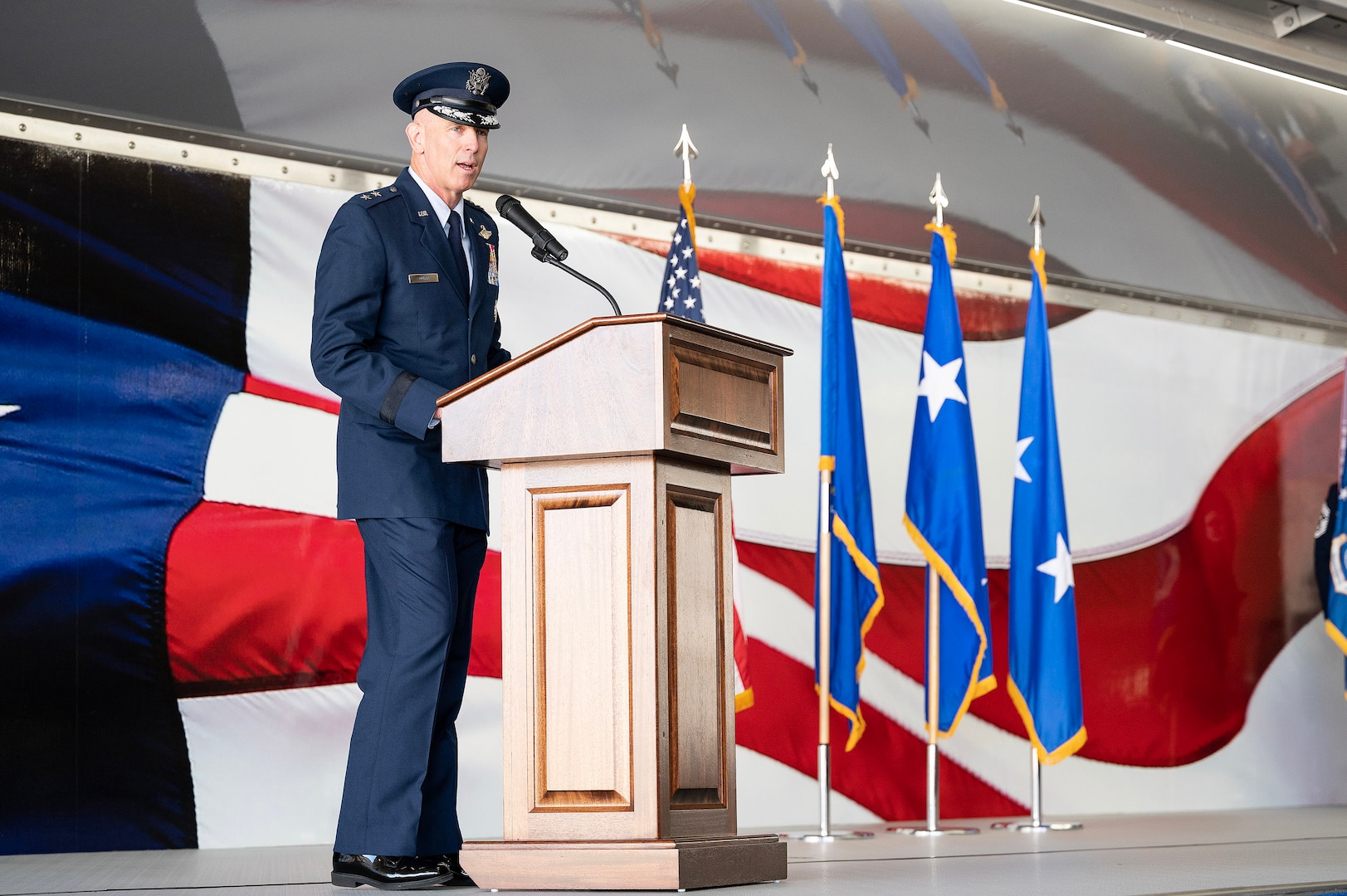 U.S. Air Force Maj. Gen. Clark Quinn, 19th Air Force commander, speaks to his command after receiving the unit guidon during the 19th AF assumption of command ceremony