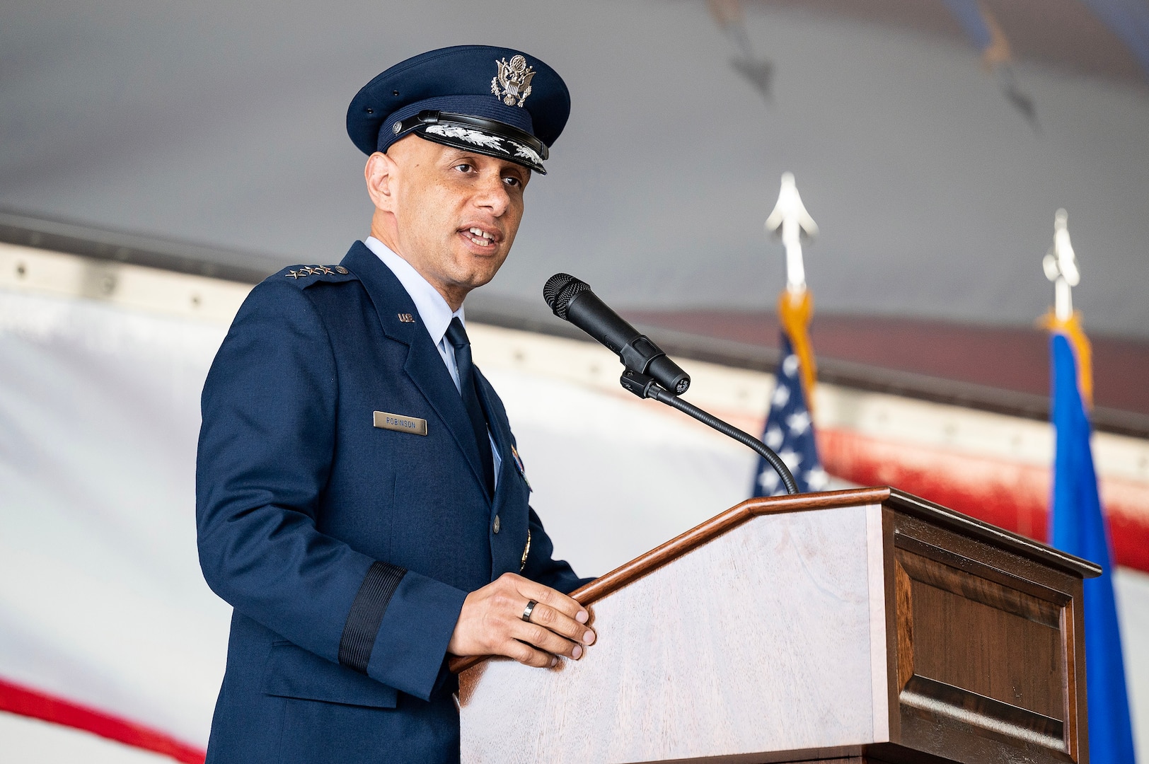 U.S. Air Force Lt. Gen. Brian Robinson, commander of Air Education and Training Command, speaks during the 19th Air Force assumption of command.