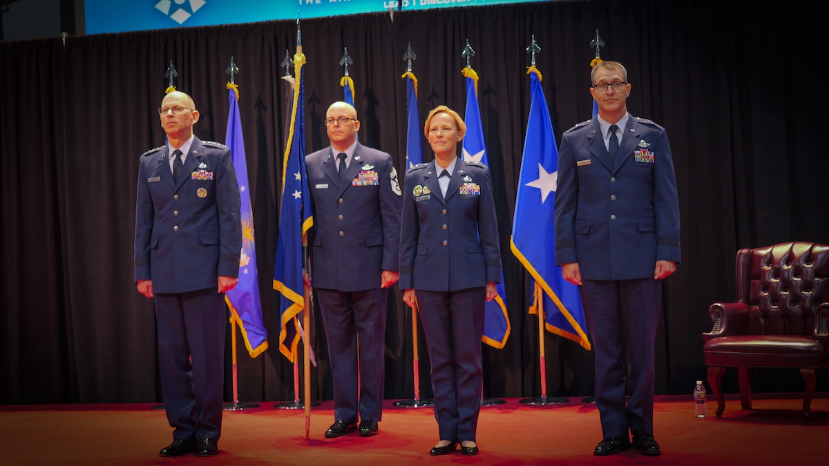From left: Gen. Duke Z. Richardson, commander, Air Force Materiel Command; Chief Master Sgt. Bill Fitch, Air Force Research Laboratory command chief; Maj. Gen. Heather L. Pringle, outgoing AFRL commander; and Brig. Gen. Scott A. Cain, AFRL commander, stand before the audience during a change of command ceremony for AFRL at the National Museum of the U.S Air Force, June 5, 2023. Cain was chosen to be the 13th commander of AFRL and said he looks forward to the new position. He previously served as director of Air, Space and Cyberspace Operations at Headquarters, Air Force Materiel Command. (U.S. Air Force photo / Keith Lewis)