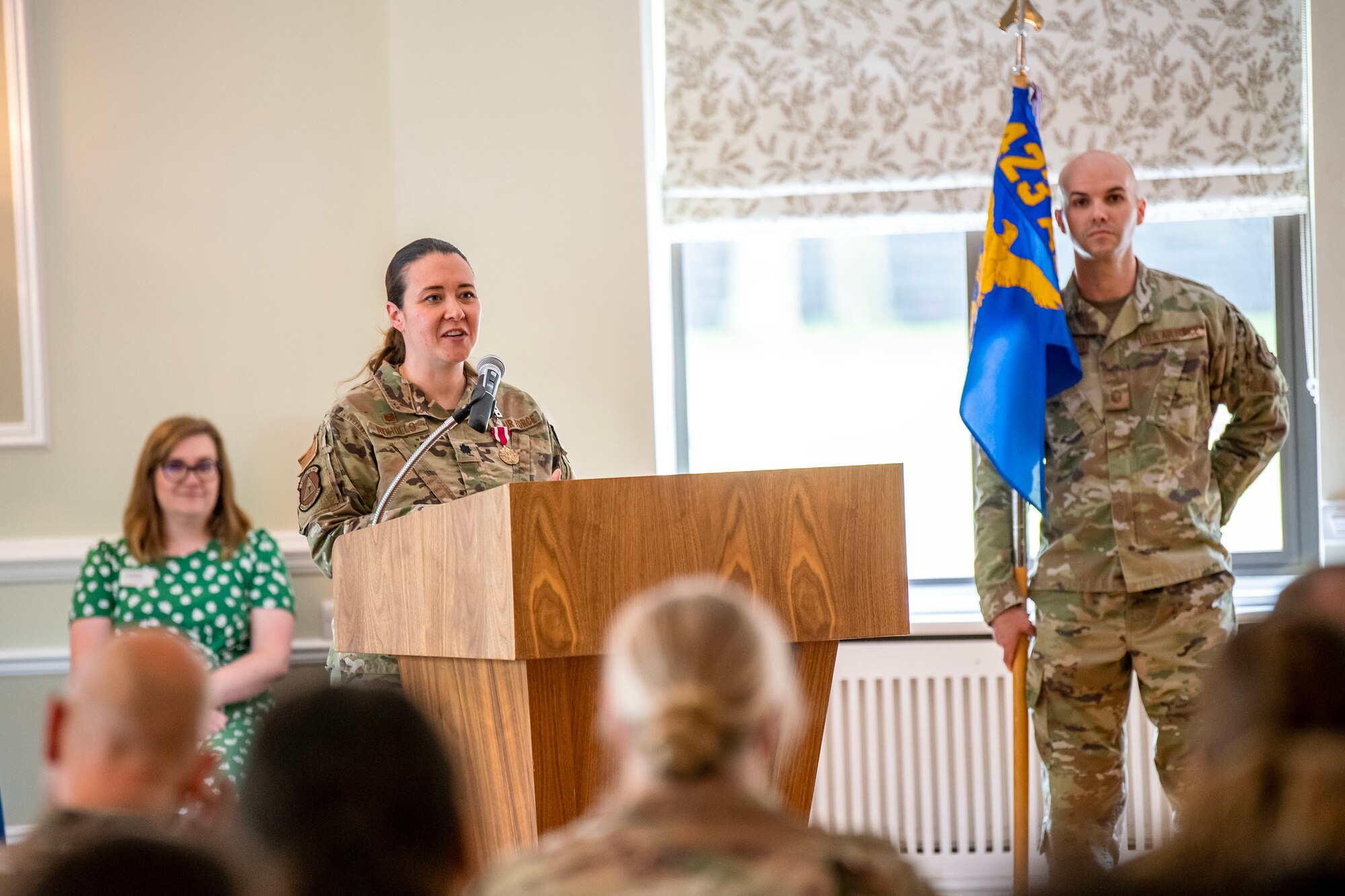 U.S. Air Force Lt. Col. Kirsten Nicholls, 423d Force Support Squadron outgoing commander, speaks during a change of command ceremony at RAF Alconbury, England, June 5, 2023. During the ceremony, Nicholls relinquished command of the 423d FSS to Maj. Roy Surita. (U.S. Air Force photo by Staff Sgt. Eugene Oliver)