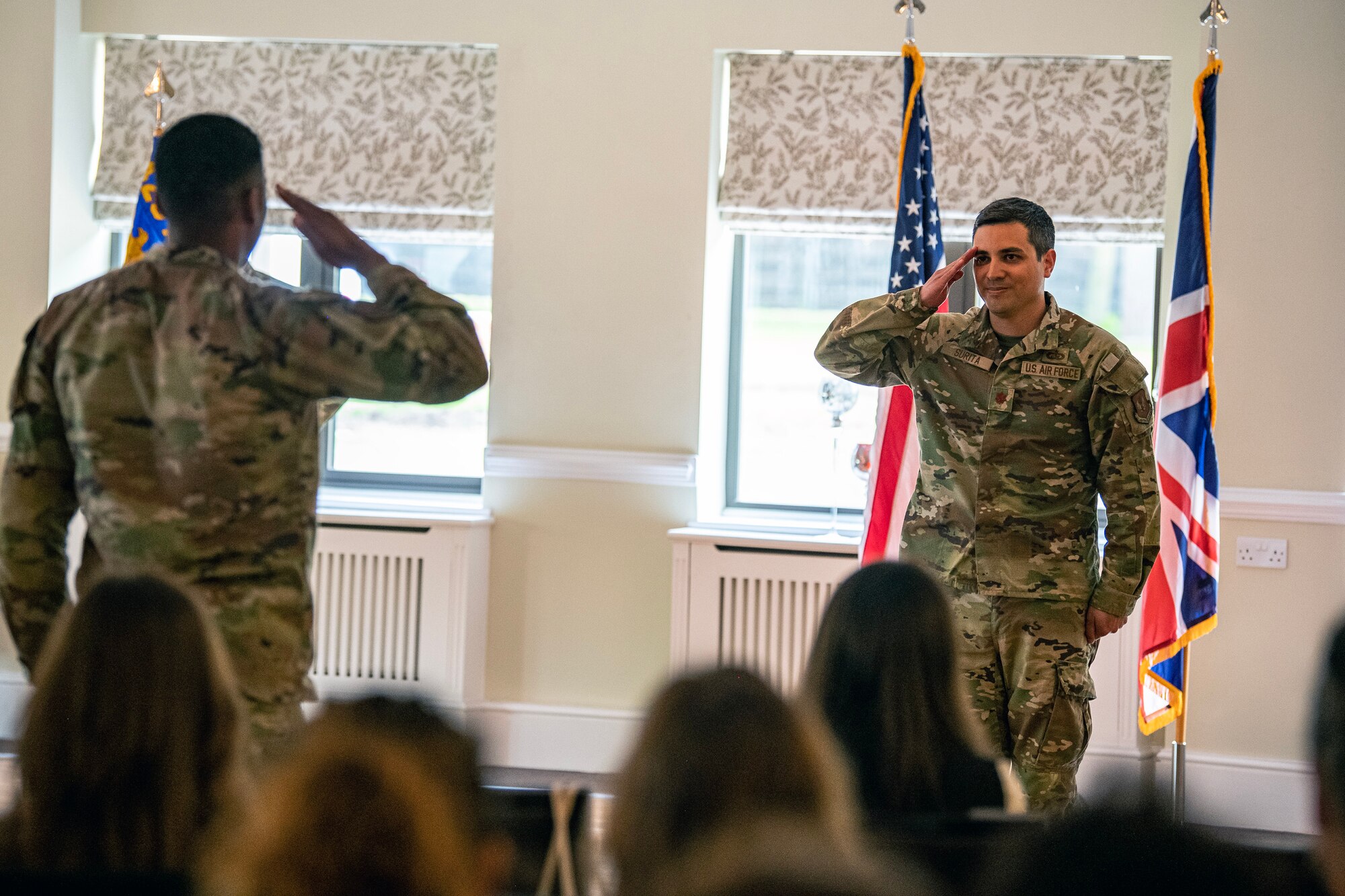 U.S. Air Force Maj. Roy Surita, 423d Force Support Squadron incoming commander, renders a first salute to an Airman from the 423d FSS during a change of command ceremony at RAF Alconbury, England, June 5, 2023. Prior to assuming command, Surita served as the Chief Officer of Force Development Policy at Headquarters U.S. Air Force, the Pentagon, Arlington, Virginia. (U.S. Air Force photo by Staff Sgt. Eugene Oliver)