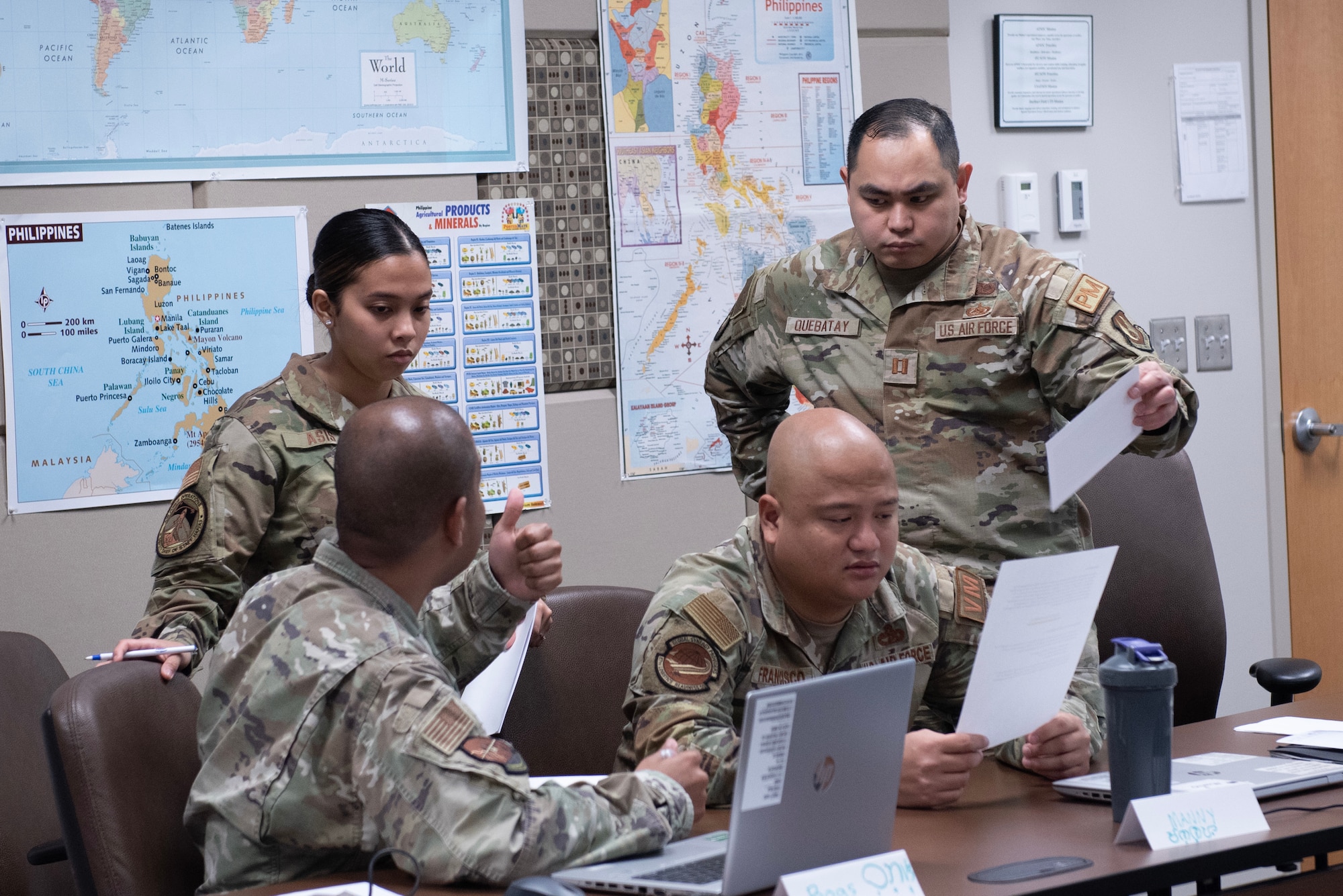 Tagalog Language Enabled Airman Program Scholars prepare for role-play scenarios focused on addressing issues of basing in the Indo-Pacific, May 18, 2023, Hurlburt Field, Fla. The Airmen were taking part in a three-week agile combat employment course, May 8-26, sponsored by Hurlburt’s Air Force Special Operations School and the Defense Language Institute Foreign Language Center and in partnership with the Air Force Culture and Language Center at Air University, Maxwell Air Force Base, Ala. (U.S. Air Force photo by Staff Sgt. Jason Huddleston)