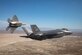 An F-22 from the 411th Flight Test Squadron and an F-35 from the 461st Flight Test Squadron fly in the skies above Edwards Air Force Base. The 461st FLTS recently took flight with a complement of software applications developed by government and industry providers previously tested on the F-22 – demonstrating for the first time the ability to use the same tactical software applications on both stealth fighters. (U.S. Air Force Photo by Kyle Larson)