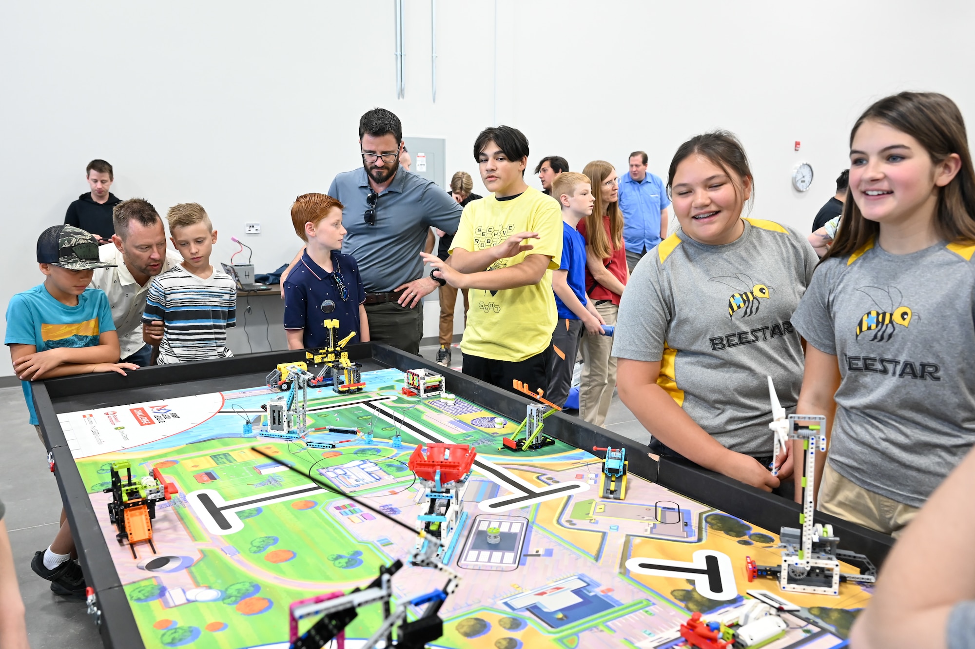 Youth teams from FIRST Robotics demonstrate and share information on designing, programming, testing, and competing with their robots June 1, 2023, to employees from Hill Air Force Base, Utah, during a lunch and learn open house event. Hill’s STEM Outreach program sponsored the event with FIRST, which is a robotics community that prepares young people for the future through a suite of inclusive, team-based robotics programs. (U.S. Air Force photo by Cynthia Griggs)