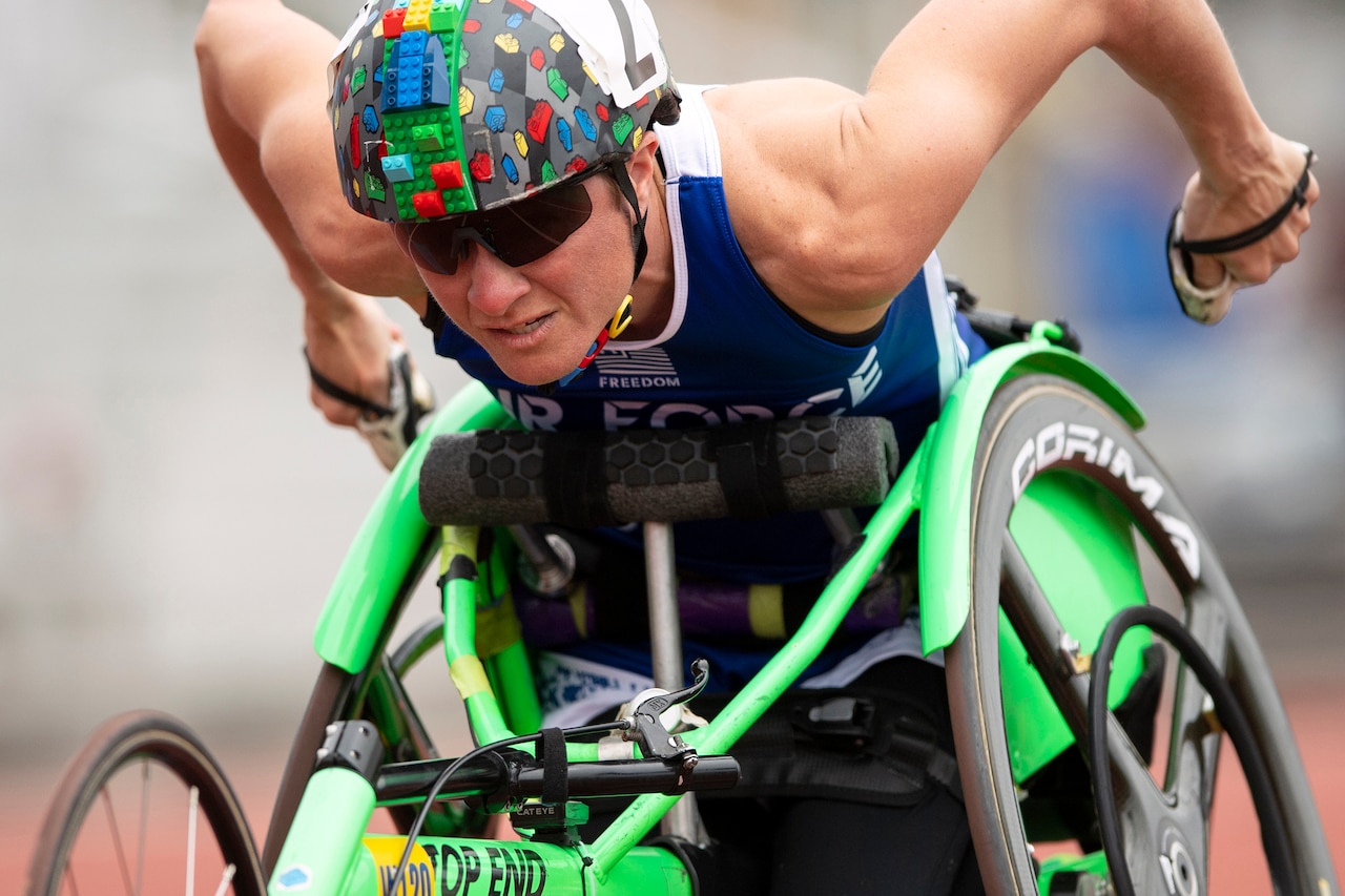 An airman in a wheelchair.