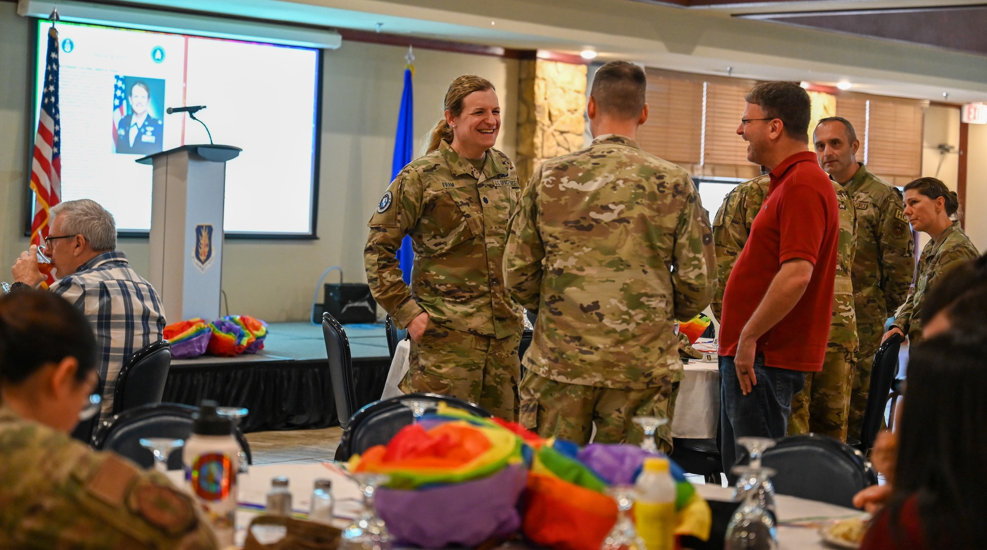 U.S. Space Force Lt Col. Bree Fram, astronautical engineer, talks with attendees at a Pride Month event held at Altus Air Force Base, June 5, 2023. Fram took questions from attendees at the event and shared her experience as a member of the LGBTQ+ community in the military. (U.S. Air Force photo by Airman 1st Class Heidi Bucins).